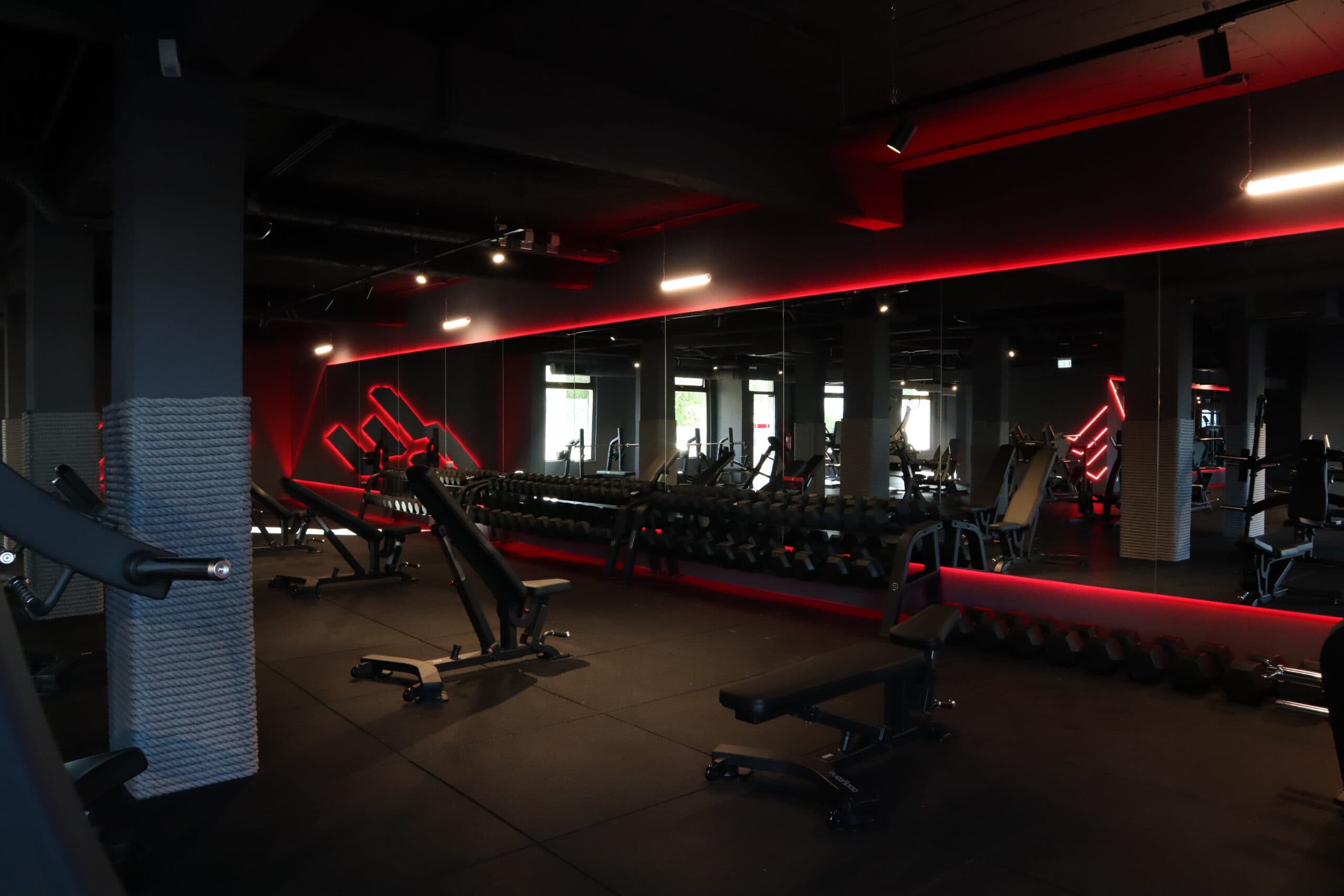 a couple of black dumbs sitting on top of a table