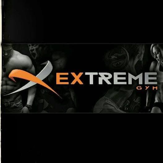 three pairs of assorted-color Rogue bumper plates