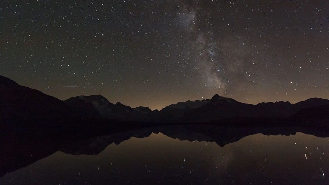 Man exercising on outdoor gym equipment